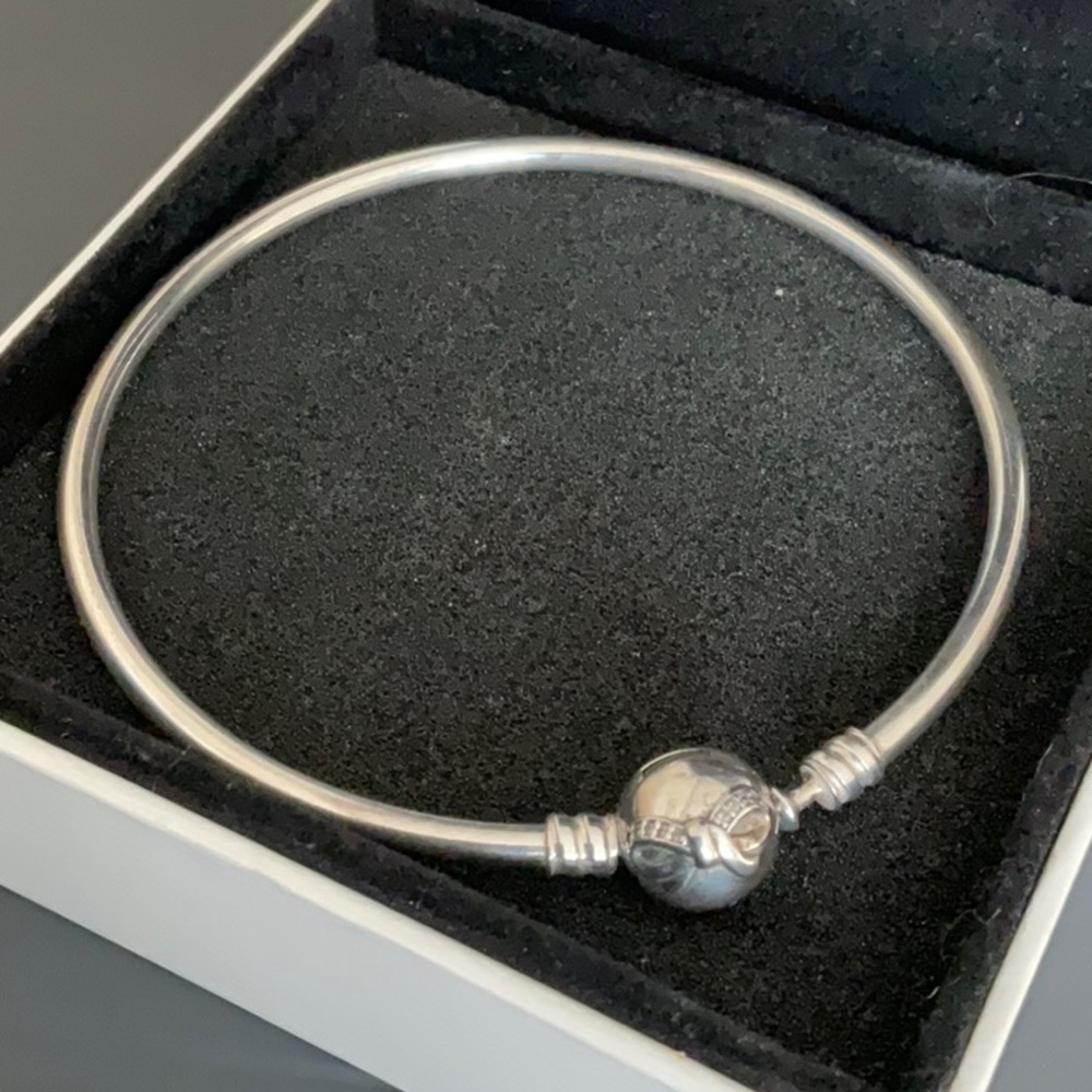 Pandora silver bangle with bow clasp